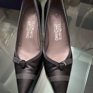 Salvatore Ferragamo pumps.